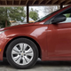 The front approach angle is very bad. Also note the attractive hubcap design. The car’s paint is great at hiding dirt and grime without being silver.